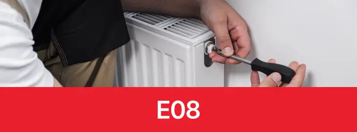 Alpha boiler displaying E08 error code indicating a pump or circulation fault during heating operation.