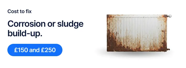 Old rusty radiator showing corrosion and sludge build-up that restricts water flow in a heating system.