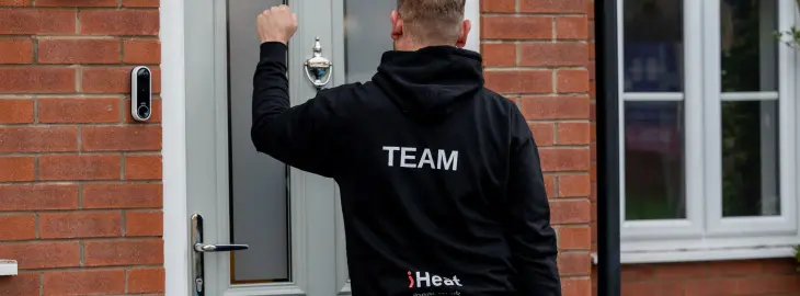 iHeat engineer arriving at a customer’s home to carry out initial boiler safety checks before installation.