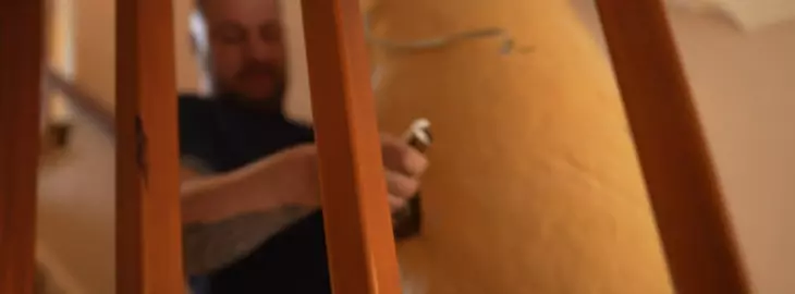 Qualified iHeat engineer safely removing an old gas boiler from a customer’s property before fitting a new model.